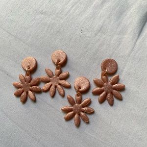 Handmade polymer clay earrings, durable and trendy.